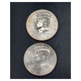 (2) 2009 Kennedy Half Dollars…..1 is mint mark D and 1 is mint mark P