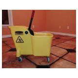 Rubbermaid Commercial Mop Bucket on wheels with wringer.