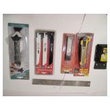 75 Razor Blades, Snap Blade Utility Knife, 10 Pack Snap Blades, 12 pc.  Reciprocating Saw Blades, Silicone Trowel & Scraper, Metal Ruler Cork on bottom.