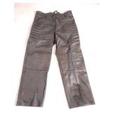 Leather Padded Motorcycle Riding Pants, no maker or size, but they are small. Some wear.
