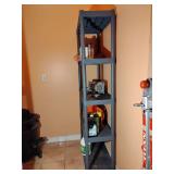 Shelving unit, black plastic, 5 tier, used, some staining bottom shelf, 74" T x 34"W x 14 1/4"D. Other contents not included.