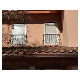 1 Decorative Exterior Window Grill, aged green finish, the mounting sides are 42 1/2" inside width, 44 1/2" outside width, 28 3/4" T, where it curves is 11 3/4" at deepest. Photo shown on house is an 