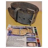 Weight Lifting Belt. Small, has been sitting awhile and is quite rigid.