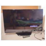 42" LG TV, Flat Screen, powers up though not hooked up to cable, remote included.