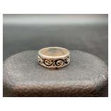 Silver tone filigree design ring…..size 6-1/8