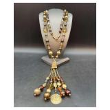 Extra long necklace with acrylic/brass tone/silverplate beading….piece is doubled for pics