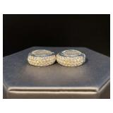 Pair of beautiful magnetic closure earrings with sparkling rhinestones on one side and silver tone on the other