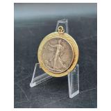 1942 Walking Liberty Half Dollar mounted on gold-tone pendant