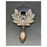 Silver tone leaf brooch/pin with dangle drop….markings are not visible so there’s no verification if possibly sterling