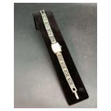 Ladies Rumours wrist watch with decorative band (marked 42886) on back