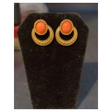 Gorgeous pair of post back gold tone earrings featuring cabochons