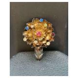 Vintage gold-tone over sterling flower brooch with multi-colored rhinestone accents…..1-3/4” long