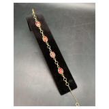 Vintage gold tone bracelet with oval cloisonné settings…..7”