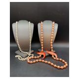 (2) beaded necklaces…..left is white and right is light coral color with shrimp accents