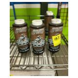 Golden spectro motorcycle lubricant, three bottles