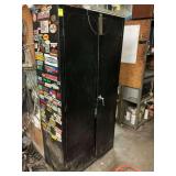Metal two door black shelving unit, including contents. 36 x 72 x 18.