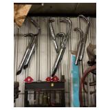 Group of exhaust pipes on wall as shown