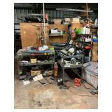 2 work benches 48 x 36 x 24.., two metal shelving units, includes all contents on and under work benches and shelves with exception of the air house