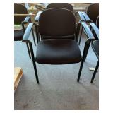 Pair of black office chairs