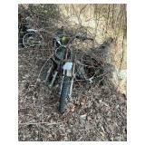 Lot of 10 motorcycles in various conditions behind building, buyer responsible for removal. See photos.