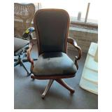 Vintage wood and black rolling office chair. ( just needs cleaned )
