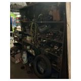 Three shelves, including all contents on, above and in front.