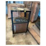 Rolling shelf with compartment on bottom. 24 x 42 x 18.