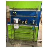 Six shelf aluminum rolling rack. Contents not included. 47 x 18 x 77.