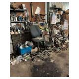 Workbench and two shelving units complete with miscellaneous tools and parts and catalogs