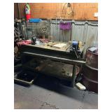 Shop bench with metal drain pan and vice grip. The bench itself is 60 x 34 x 24 with the 6 foot tray attached making it 30 inches