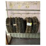 Group of 10 camouflage tires see photo for size