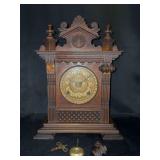 An Early 20th Century American Eight Day Salem Mantel Clock by The Ansonia Clock Co, New York…..2 pieces need reattached…..has key and only one side turns…..15” tall