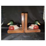 Pair of Albert E. Price wood bookends with porcelain mallard ducks…..suck on right needs reattached to base