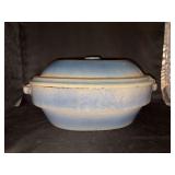 Vintage well loved and used blue stoneware lidded roaster…..does have chipping from normal use around rim of lid…..tag priced at $235…..15” long x 8” tall to top of lid