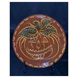 Vintage Pennsylvania Dutch Ned Foltz redware pumpkin plate…..7”D