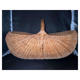 Large vintage hand-woven splint buttocks gathering basket….19-1/2 x 10-1/2 x 12-1/2 tall to top of handle