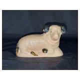 Antique (c.1830) ceramic ram featuring a beige or buff colored body and black accents for ears, etc. Piece is not marked but priced at $750…..does have blemishes but in good condition considering th