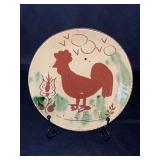 Vintage Pennsylvania Dutch Breininger Rooster redware pottery plate…..7”D….stand not included