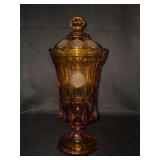 Vintage Fostoria Coin Glass amber lidded/footed urn. This specific pattern was produced by Fostoria from 1958 to 1982…..13” tall