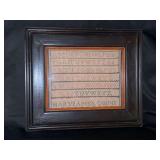 Vintage (13-1/2 x 11–/2) Sampler by Mary Jane Robin “12”……a portion of the sampler is hid down in the frame