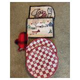 Grouping of Pennsylvania Dutch handcrafted hook placemats and oven mitt