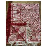 Freshly laundered Fieldcrest Americana throw blanket features a red and white jacquard pattern with fringed edges…..wove by David Kline, Red Lion, PA for Morris & Laura  Dee Robbins, AD 1998