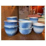 (11) pieces of Pennsylvania Dutch salt glazed pottery custard cups and bowls…..1 bowl is cracked and there is chipping