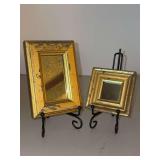Small decorative mirrors with a distressed gold finish, typical of a Shabby Chic or vintage style…..left is 3-3/4 x 5-3/4 and right is 3-1/4” square