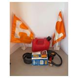 Pair of 12’ booster cables, 2 Tennessee VOLS window flags and a 1 gallon gas can