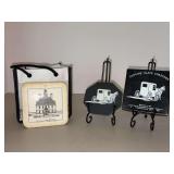 (2) sets of Primitive/Colonial design Coasters…..left is art of 4  Colonial Williamsburg with carry bag and right is a set of 3 genuine slate with horse-drawn buggy design in original box