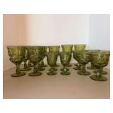 18 pieces of Fostoria “Argus' green pattern glassware with distinctive thumb print- (7) water goblets, (2) iced tea glasses, (4) stemmed juice glasses and (5) wine glasses