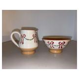 (2) pieces of Nicholas Moses Pottery “Swag & Bow”…..pitcher stands 4” tall and bowl is 5”D x 2-1/2” tall