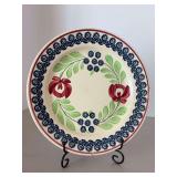 Societe Ceramique Maestricht Holland with Stick Spatter Floral design…..9-1/8”D….one small chip on rim and age cracks on back