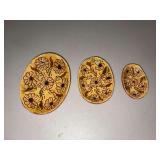 Set of (3) Lester & Barbara Breininger Redware nesting trinket trays featuring a sgraffito design of brown flowers on a yellow glazed ground…..3-3/4 x 2-3/4, 3 x 2-1/4 and 2-1/4 x 1-1/2